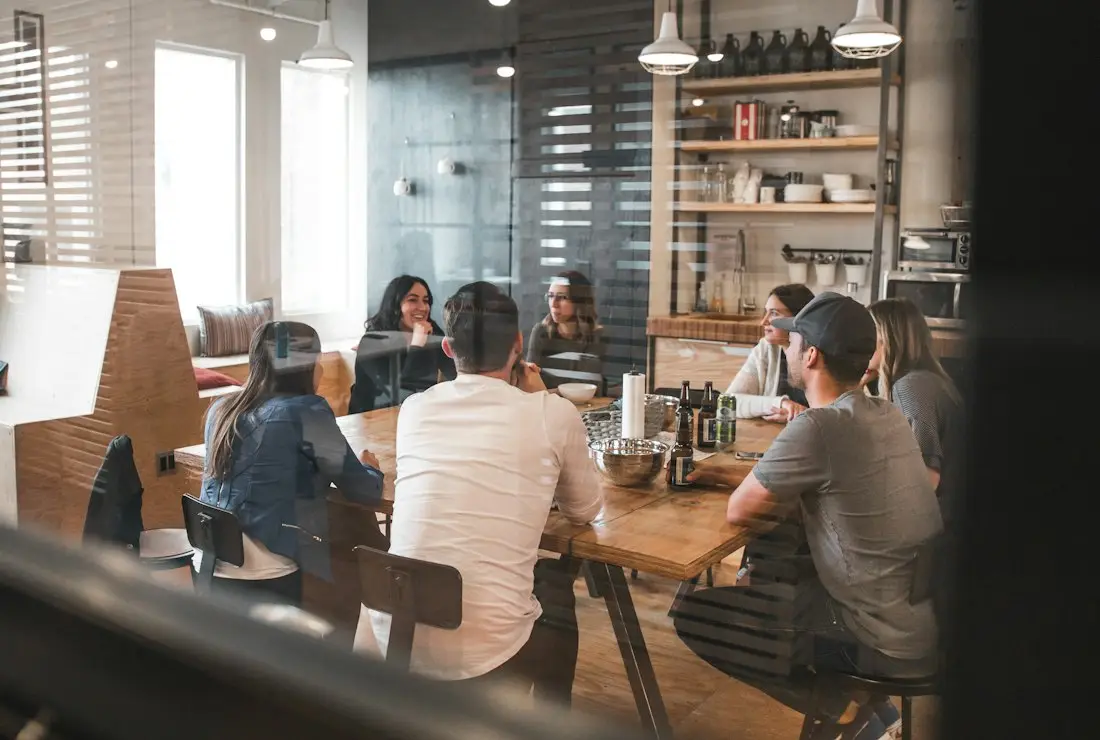Colleagues seated in a workshop session
