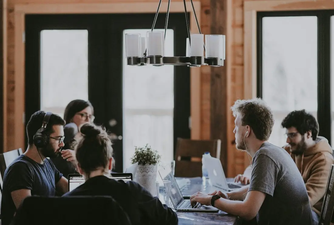 A project team seated around a table