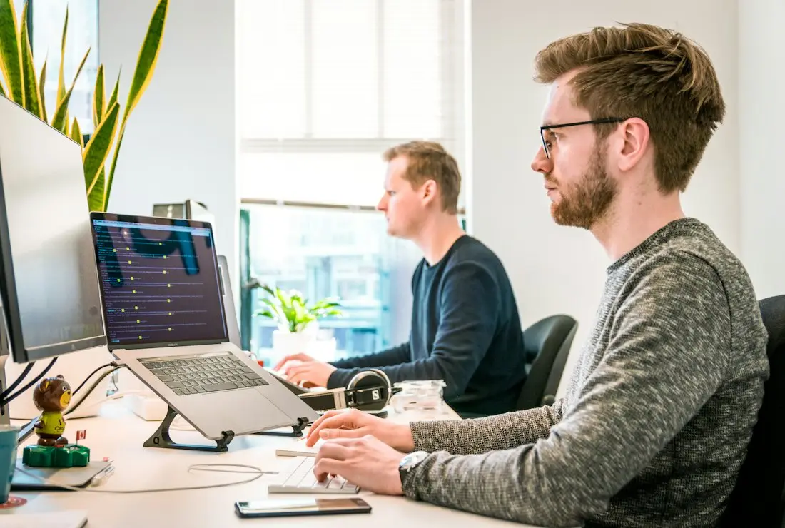 Two specialists working through a task